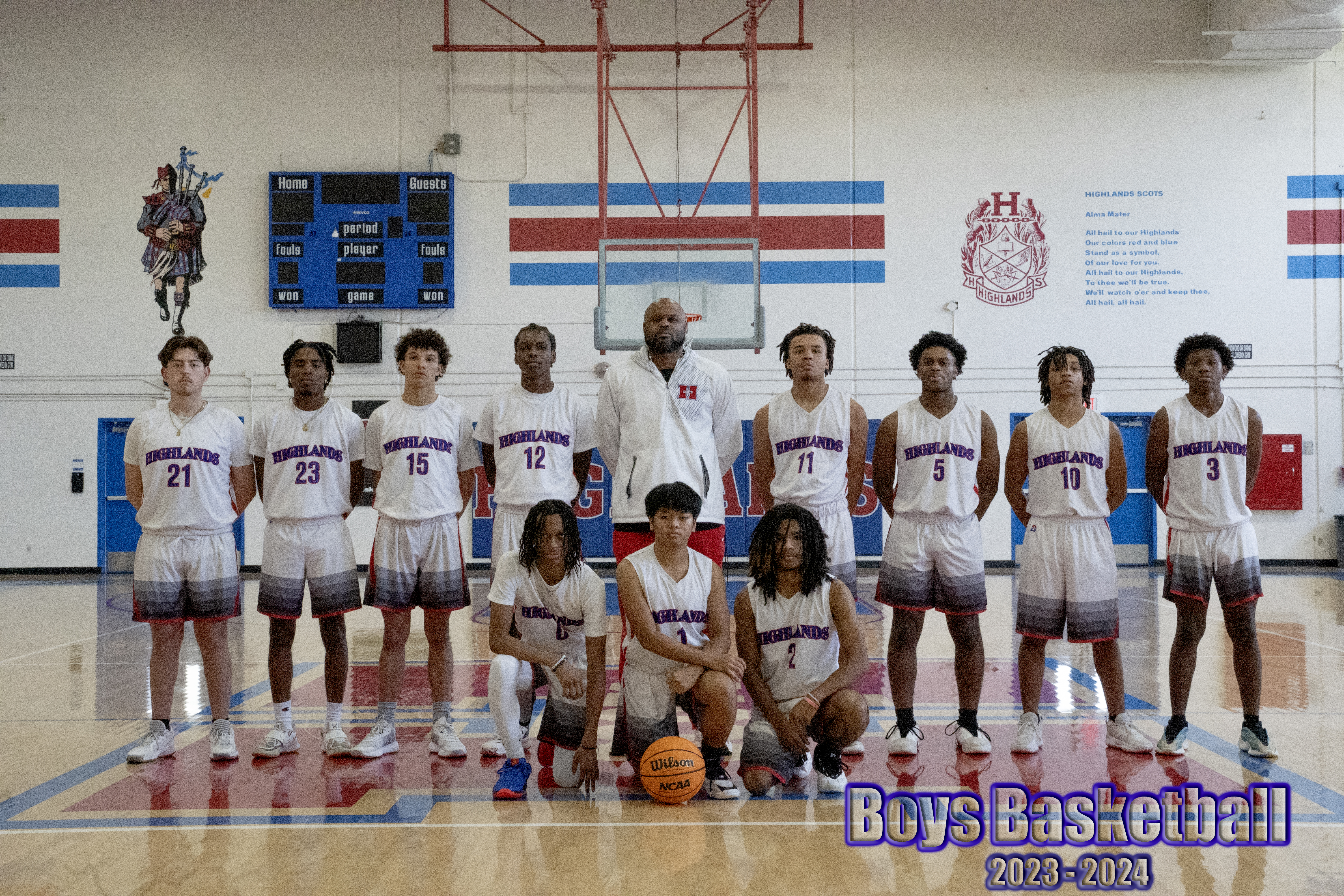 Varsity boys basketball team in gym